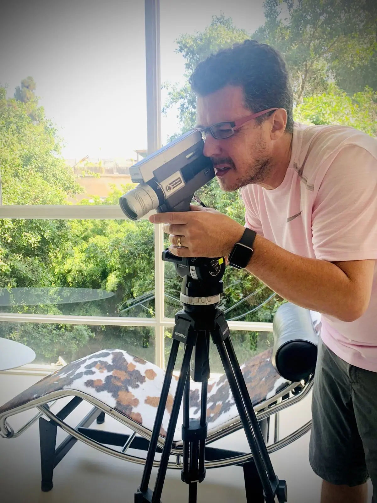 With vintage Super 8 camera